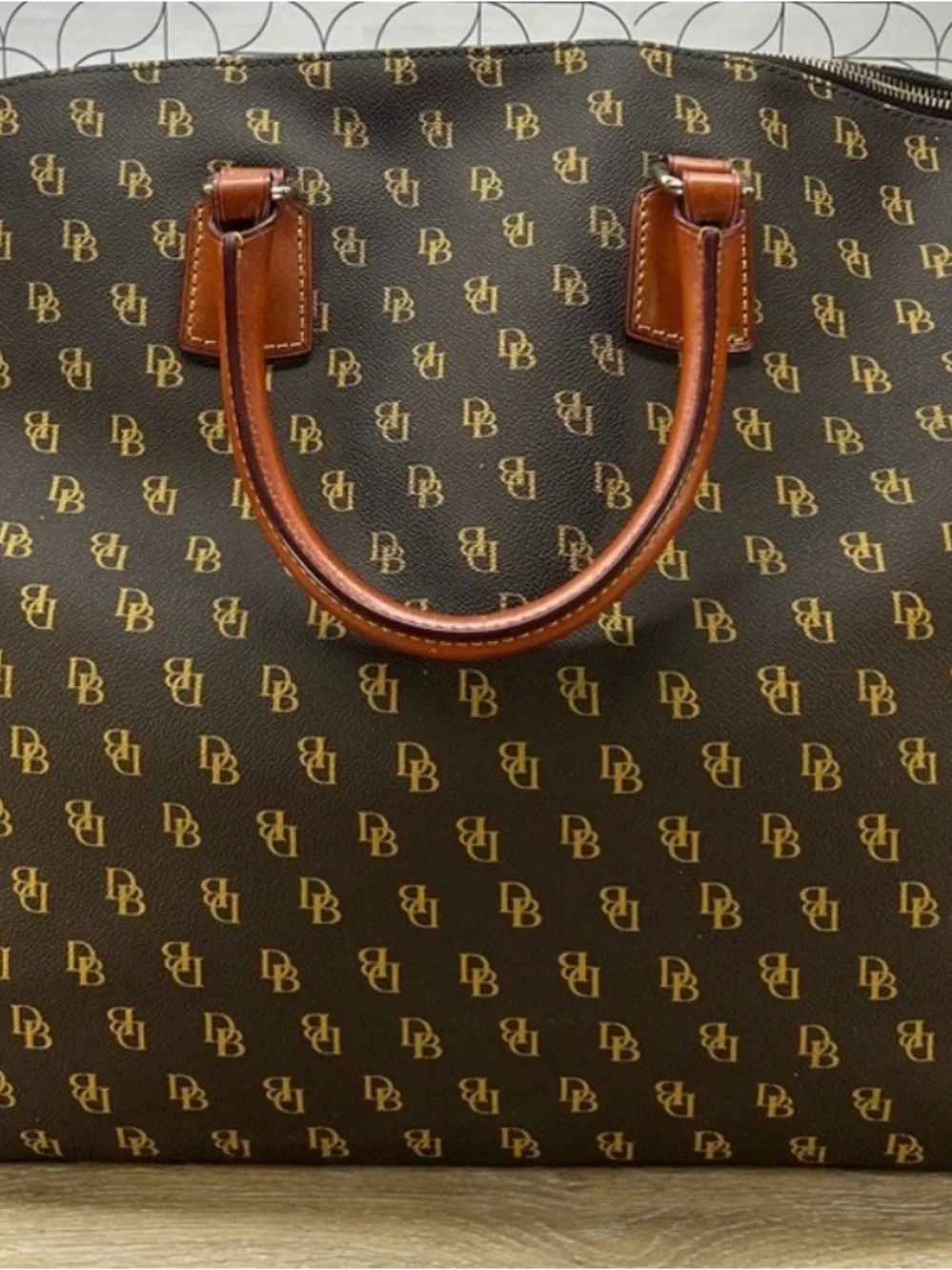 Dooney & Bourke Brown Monogram Duffel with Tan Leather Trim
